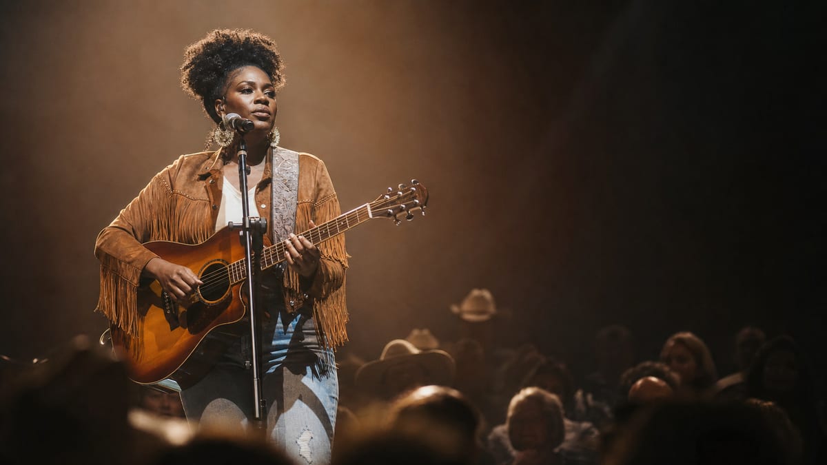 Editorial archive image illustrating Mickey Guyton and the Continuing Fight for Black Women in Country Music.